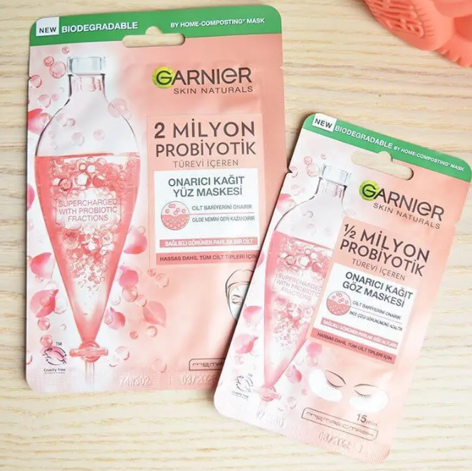   Garnier 2 Milyon ve 1/2 Milyon Probiyotik Türevi İçeren Onarıcı Kağıt Yüz Maskesi & Göz Maskesi